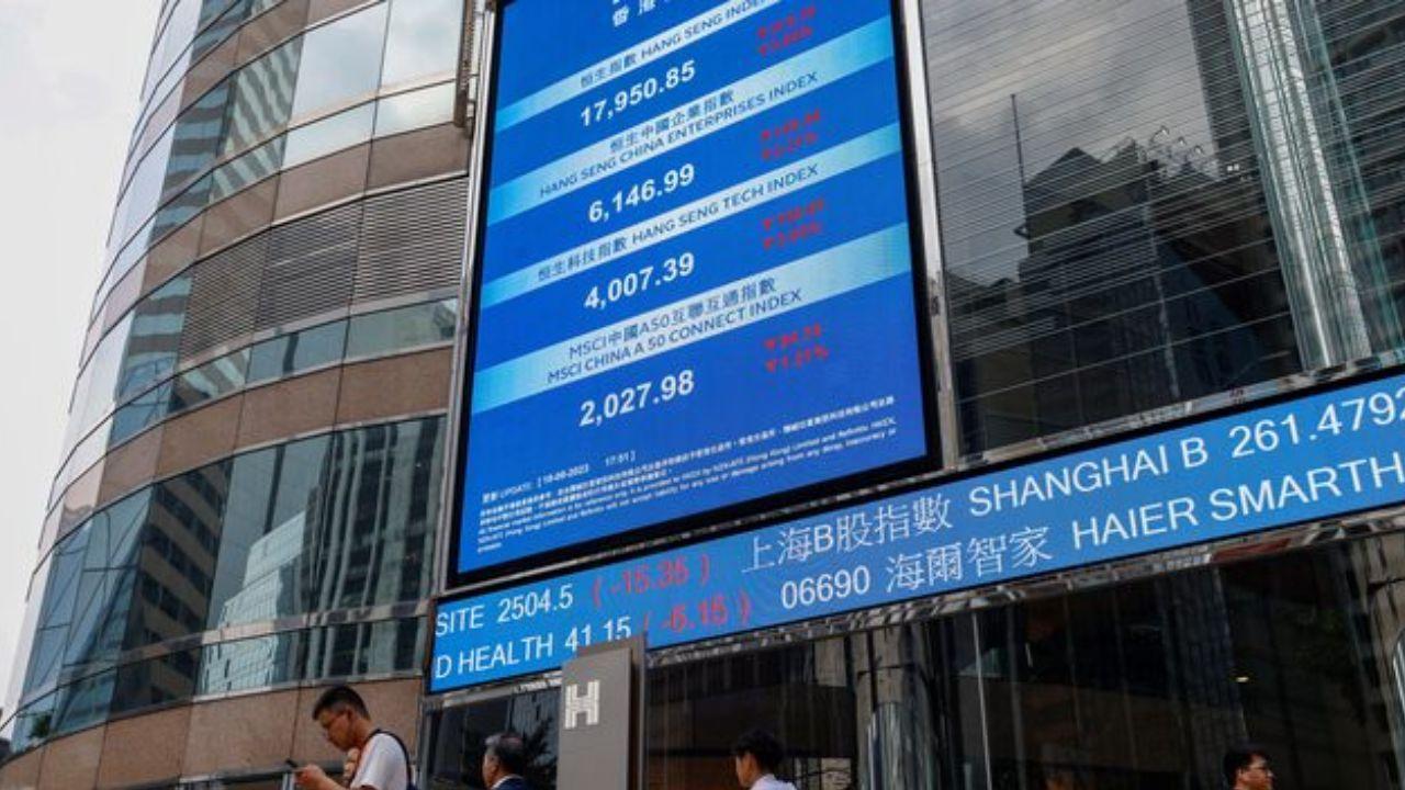 Hong Kong Stocks Fall as Tariff Risks and Middle East Conflict Hit