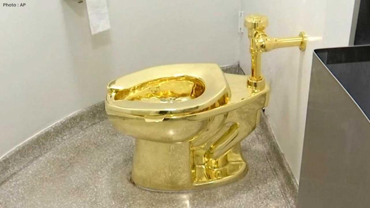 Gold Toilet 'America' Fetches $12.1M at Sotheby's NY Auction