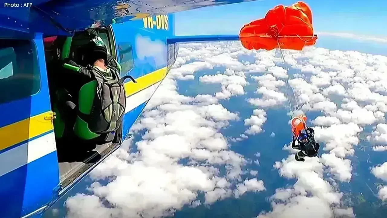 Skydiver Dangling Mid-Air After Parachute Snags Plane Tail Caught