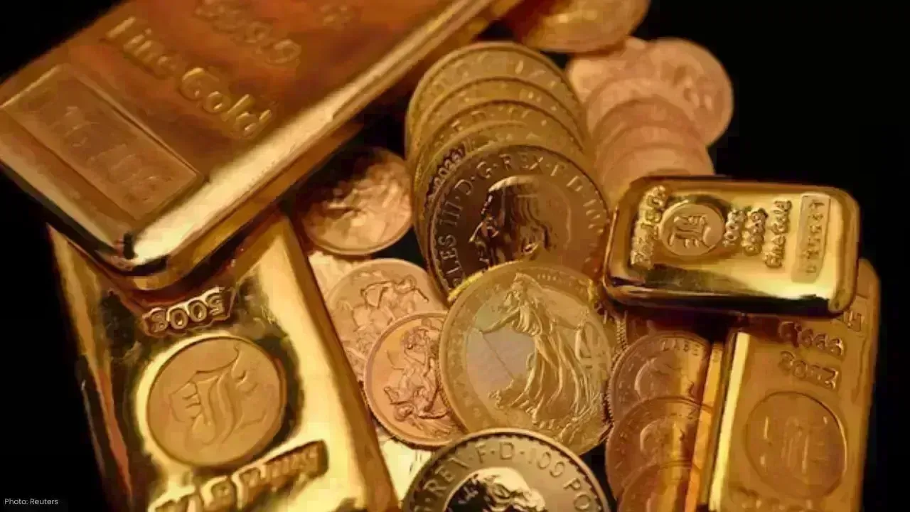 Gold Prices Slide as Strong Dollar and Futures Selling Weigh
