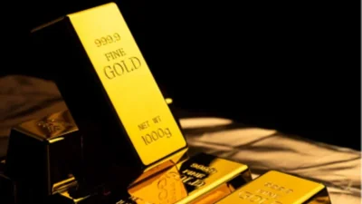 Gold Holds Near $5,000 Ahead of Fed Decision