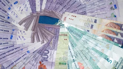 Ringgit steady as strong dollar weighs