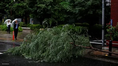 Tropical Storm Jangmi Hits Japan, Cuts Power