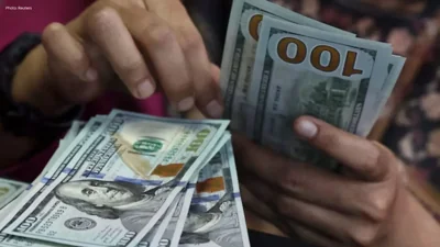 Dollar Hits Two-Month High on Fed Rate Hike Bets