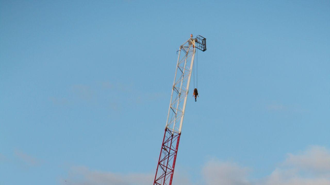 Paraglider Rescued After Getting Stuck on Tower Crane