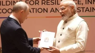 PM Modi Presents Putin Russian Translation of Thirukkural at BRICS Summit
