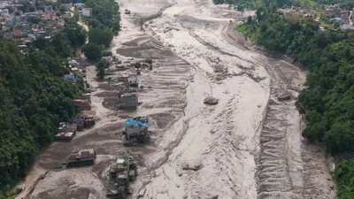 Nepal Flash Flood Sweeps Away Homes and Bridges in Gorkha